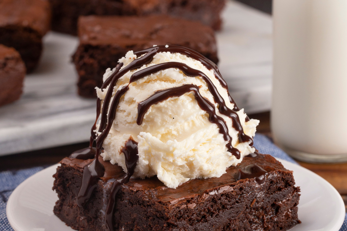 Best fudgy brownie recipe from scratch served with vanilla ice cream