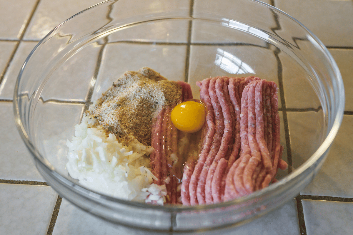 Preparing easy homemade meatloaf recipe mixture