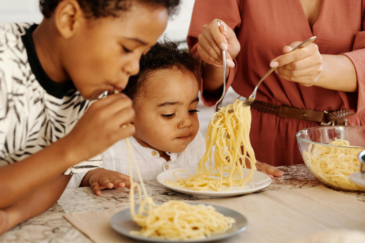 family enjoying 20-minute pasta