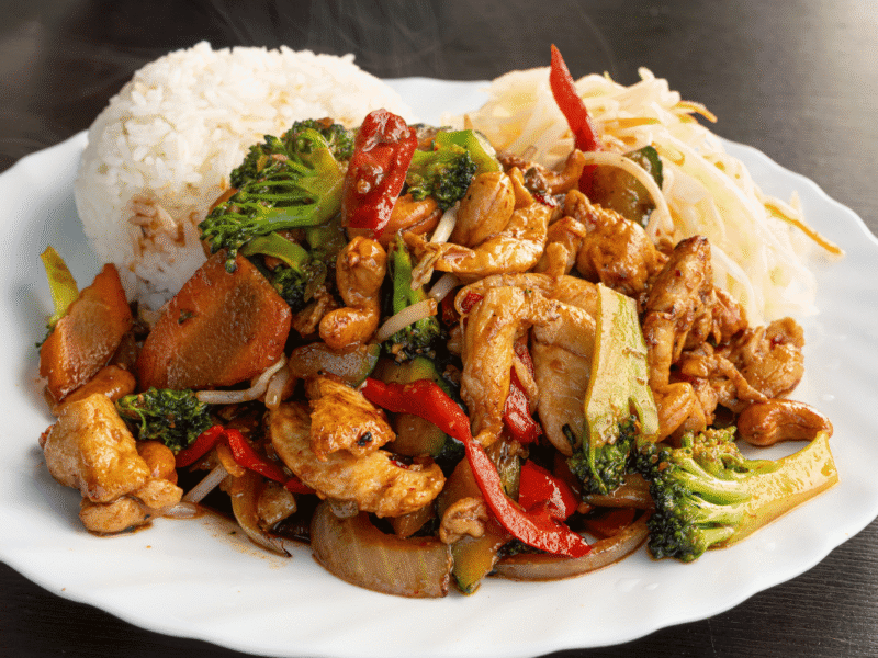 Easy chicken and vegetable stir-fry recipe served with steamed rice