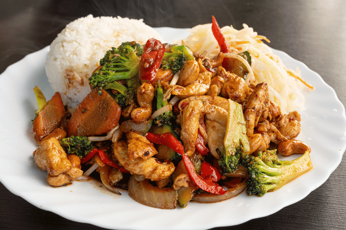 Easy chicken and vegetable stir-fry recipe served with steamed rice