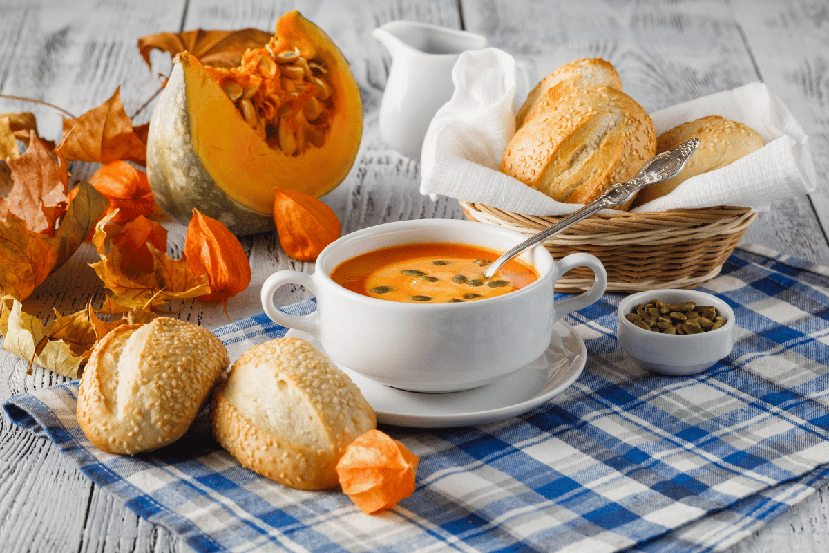 Creamy roasted butternut squash soup garnished with pumpkin seeds