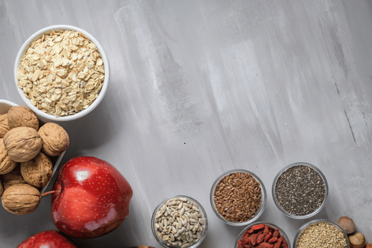 Fiber-rich breakfast ingredients including oats, chia seeds, berries, and whole grains
