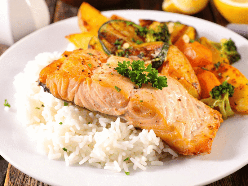 Fluffy long-grain rice served with baked salmon