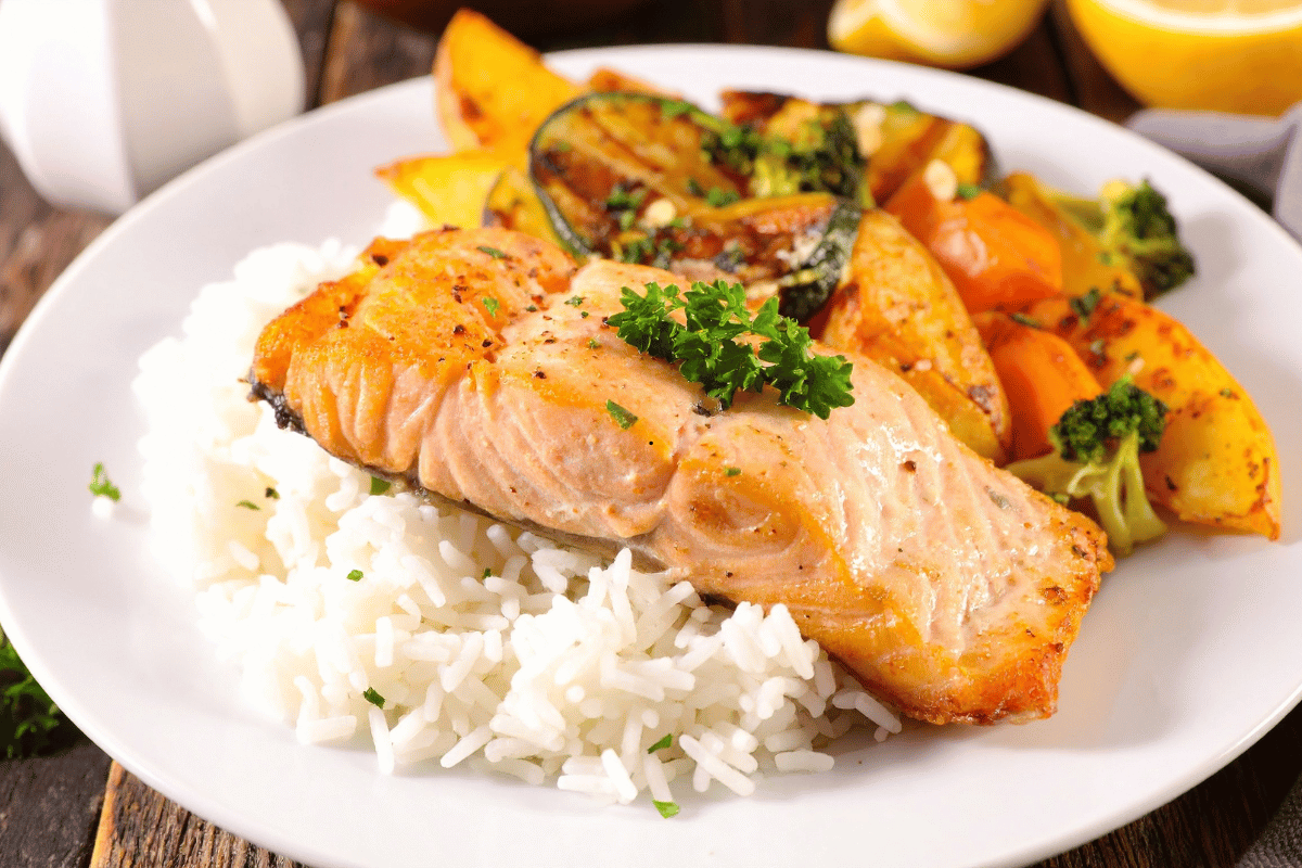Fluffy long-grain rice served with baked salmon