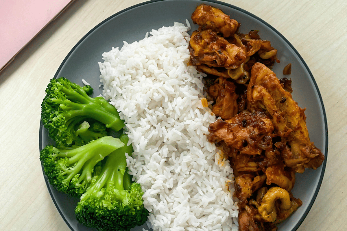 Easy Garlic Butter Chicken Bites served with rice and vegetables