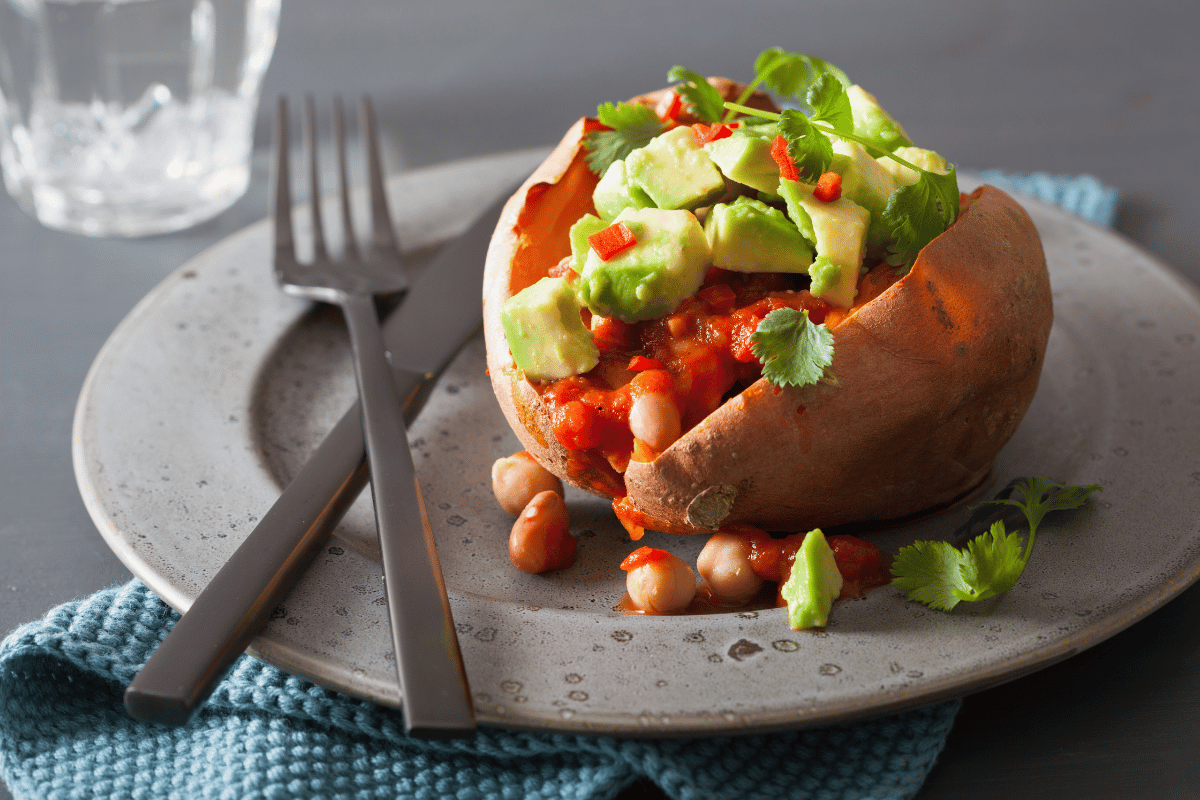 Loaded sweet potato with black beans and avocado