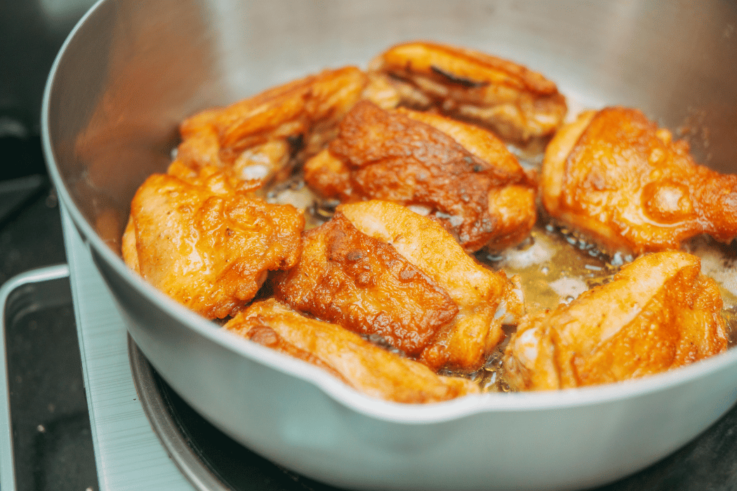 Essential cooking tips for beginners cooking chicken in a frying pan
