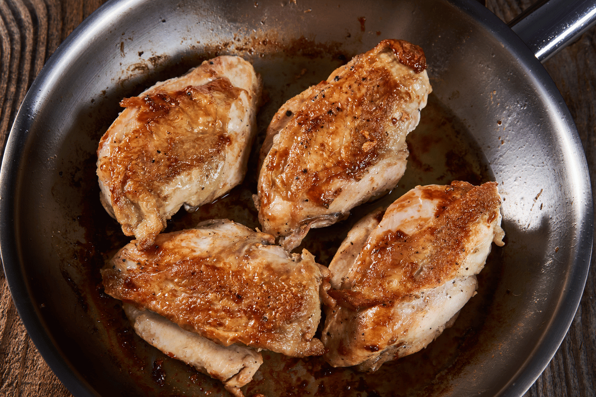 Searing chicken for Marry Me Chicken Pasta in a skillet