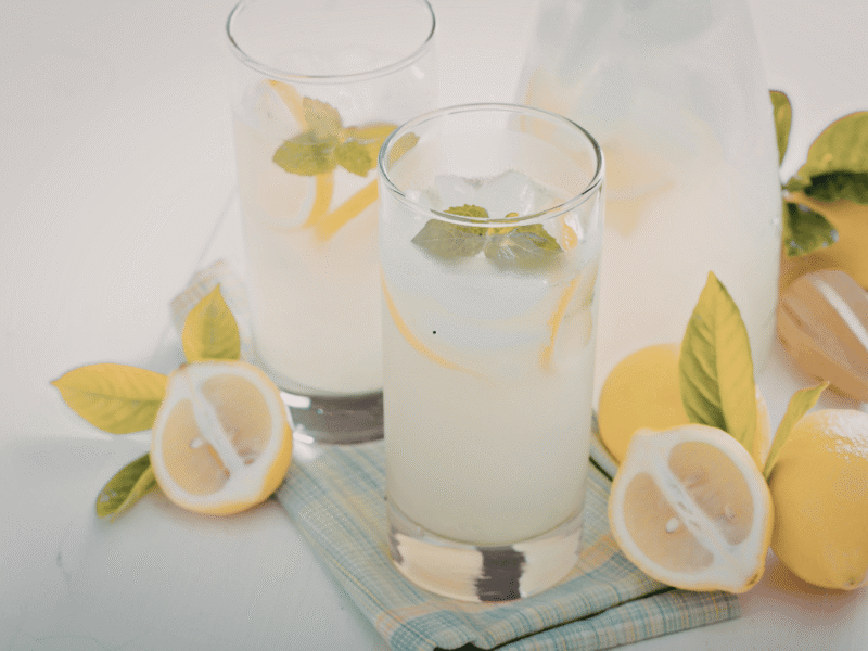 Easy homemade lemonade recipe with fresh lemons, ice, and mint