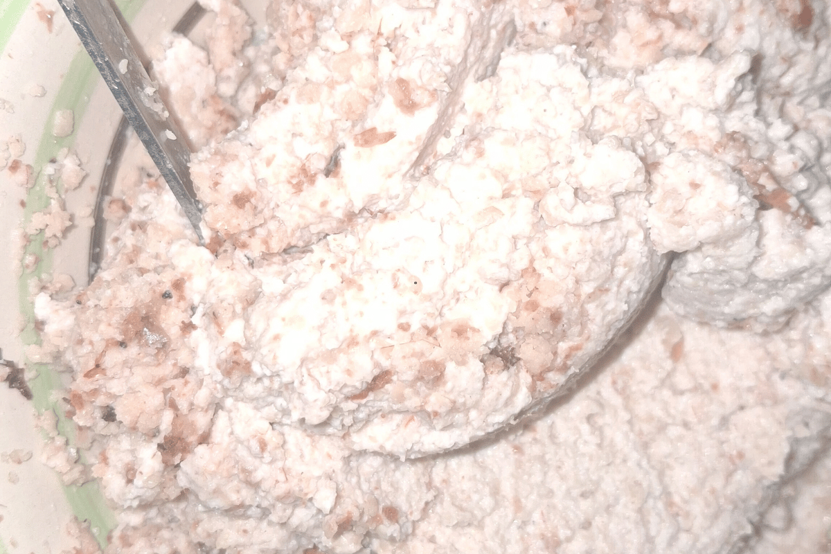Thick grinded egusi paste prepared for Nigerian egusi soup