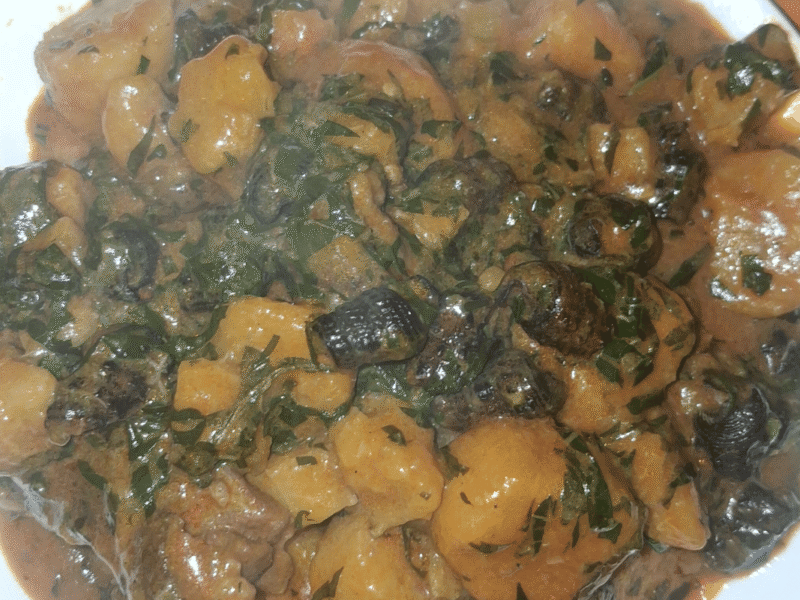 unripe plantain porridge with periwinkle and scent leaf.png