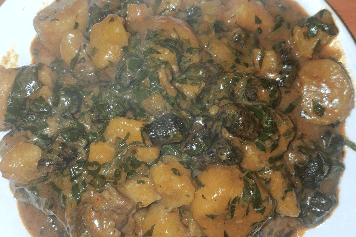 unripe plantain porridge with periwinkle and scent leaf.png